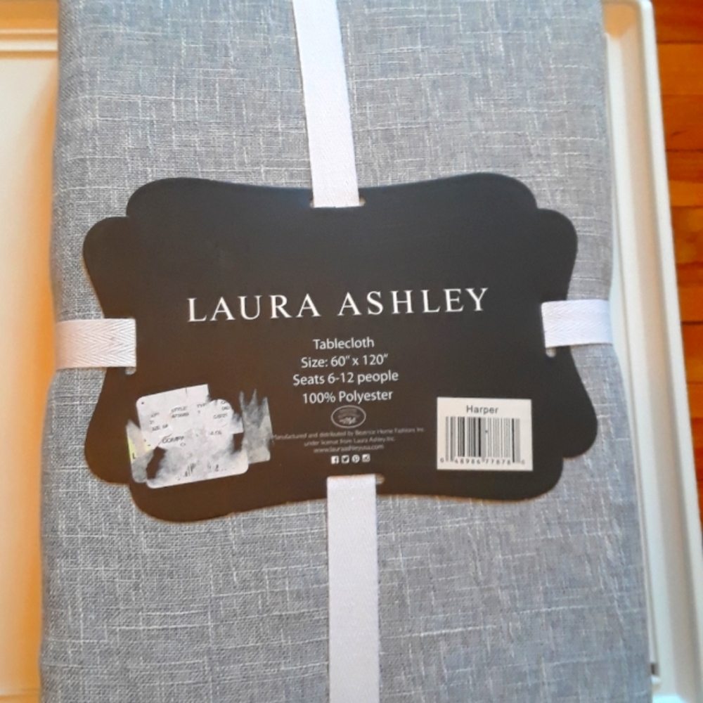 Laura Ashley tablecloth 60 x 120 new. Never used